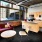 a living room with a red couch